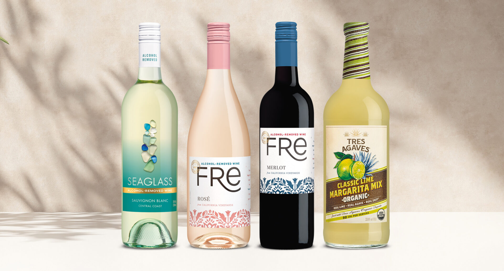 one bottle of seaglass alcohol-removed sauvginon blanc, one bottle of FRE alcohol-removed rose, one bottle of FRE alcohol-removed merlot, and one bottle of tres agaves classic lime margarita mix