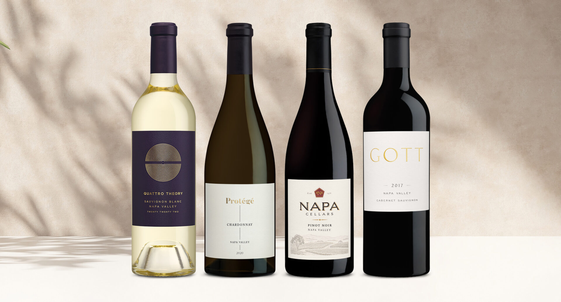 one bottle of quattro theory sauvignon blanc, one bottle of protege chardonnay, one bottle of napa cellars pinot noir, and one bottle of gott napa valley cabernet sauvignon