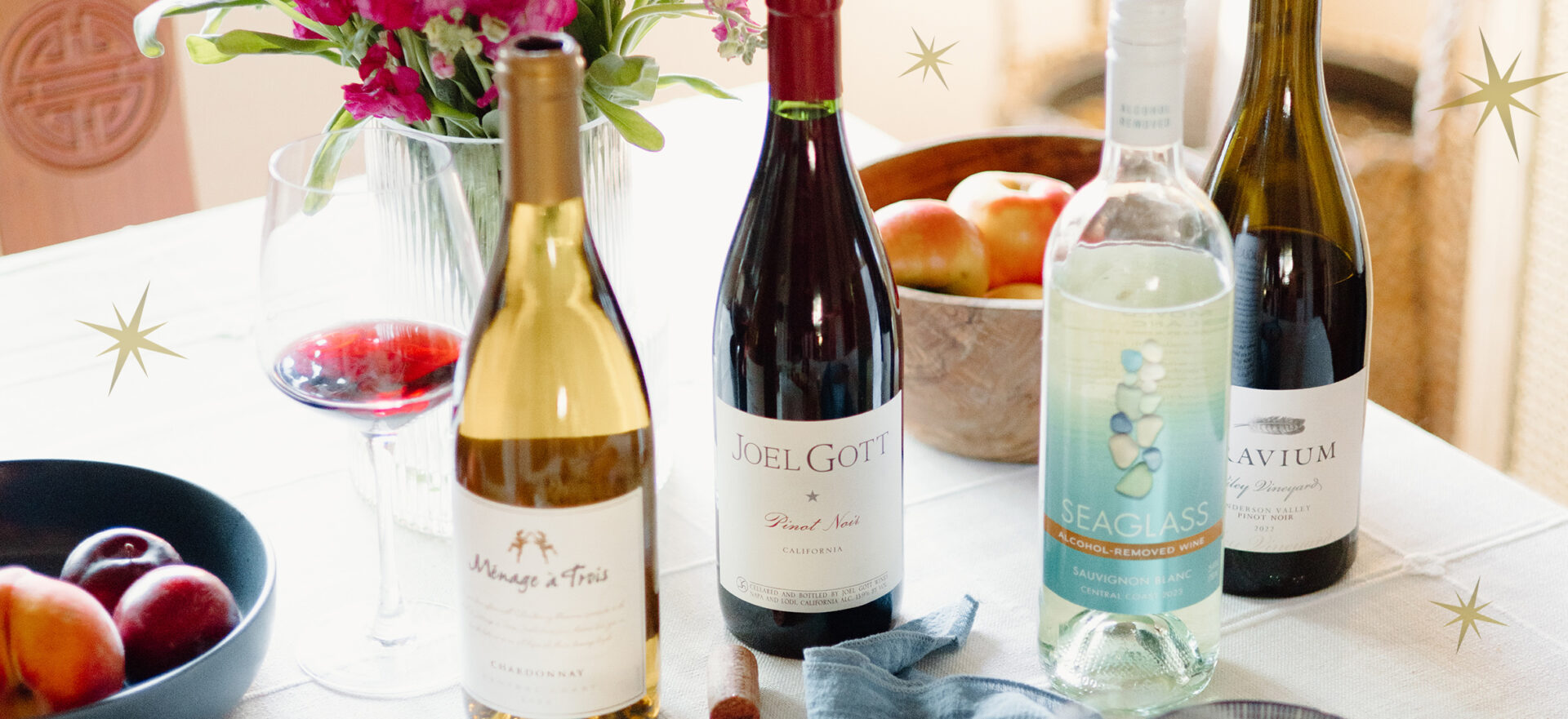 various wines from One Stop Wine Shop being served at a holiday table