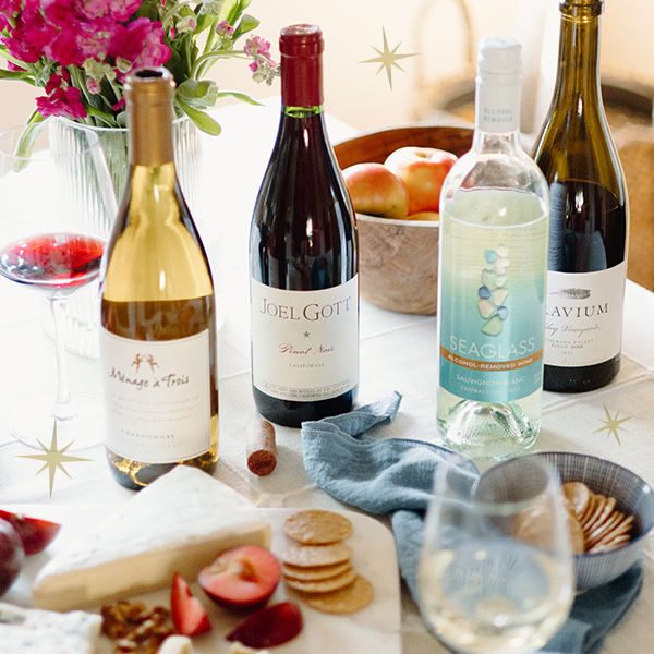 various wines from One Stop Wine Shop being served at a holiday table