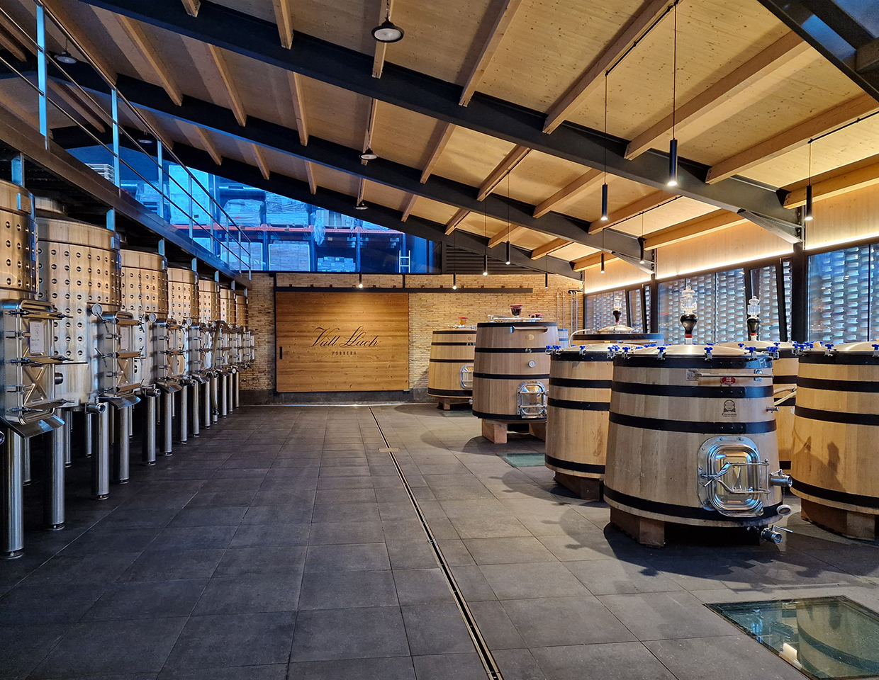 Vall Llach winery barrel room
